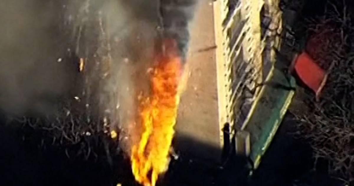 Debris falls from burning NYC apartment building