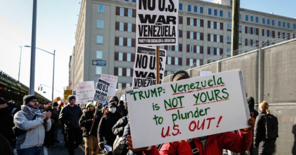 Protesters gather outside detention center where Maduro is being held