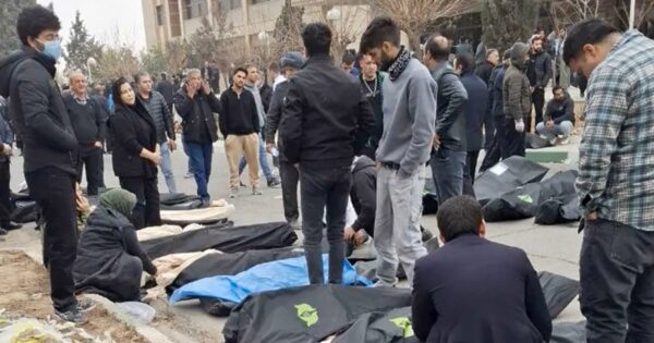 Videos of body bags and machine guns give rare glimpse of Iran’s bloody crackdown