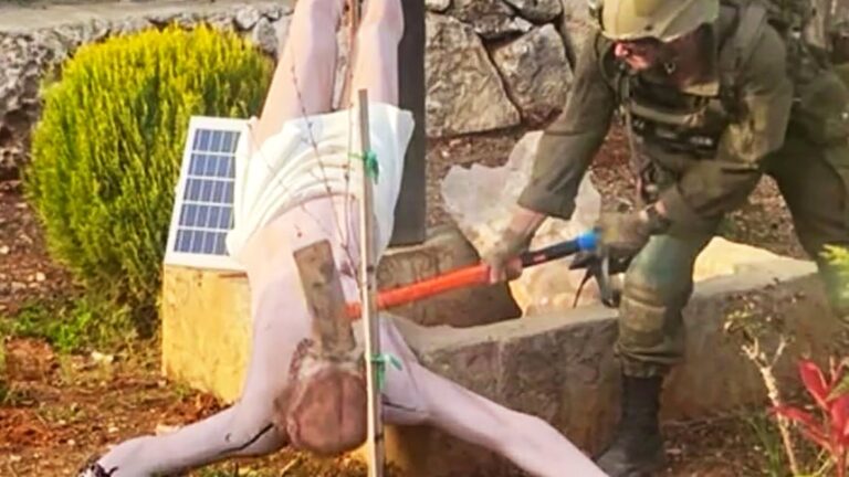 Israeli soldier strikes Jesus statue in Lebanon, photo shows