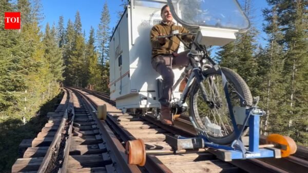 Crazy adventure: YouTuber rides 100 miles on abandoned railway tracks in a DIY rail camper |