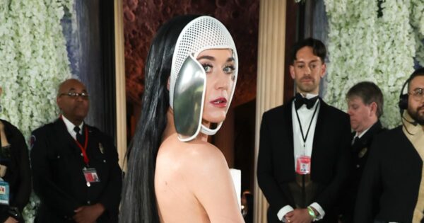 Katy Perry gives fans look behind mask