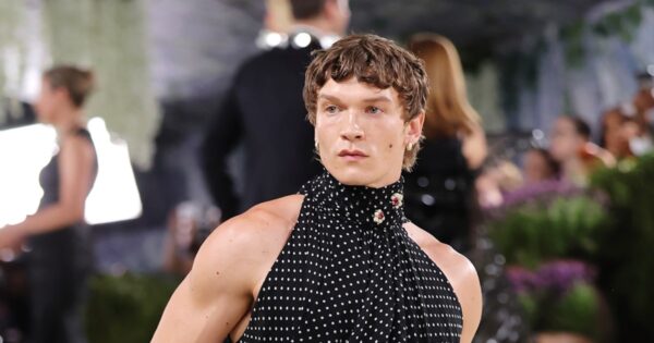 Connor Storrie turns heads in sleeveless black ensemble